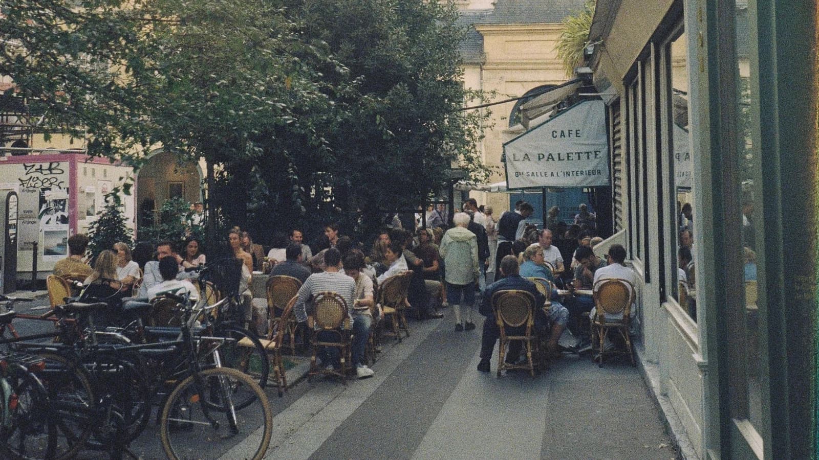 Paris street cafe with diners