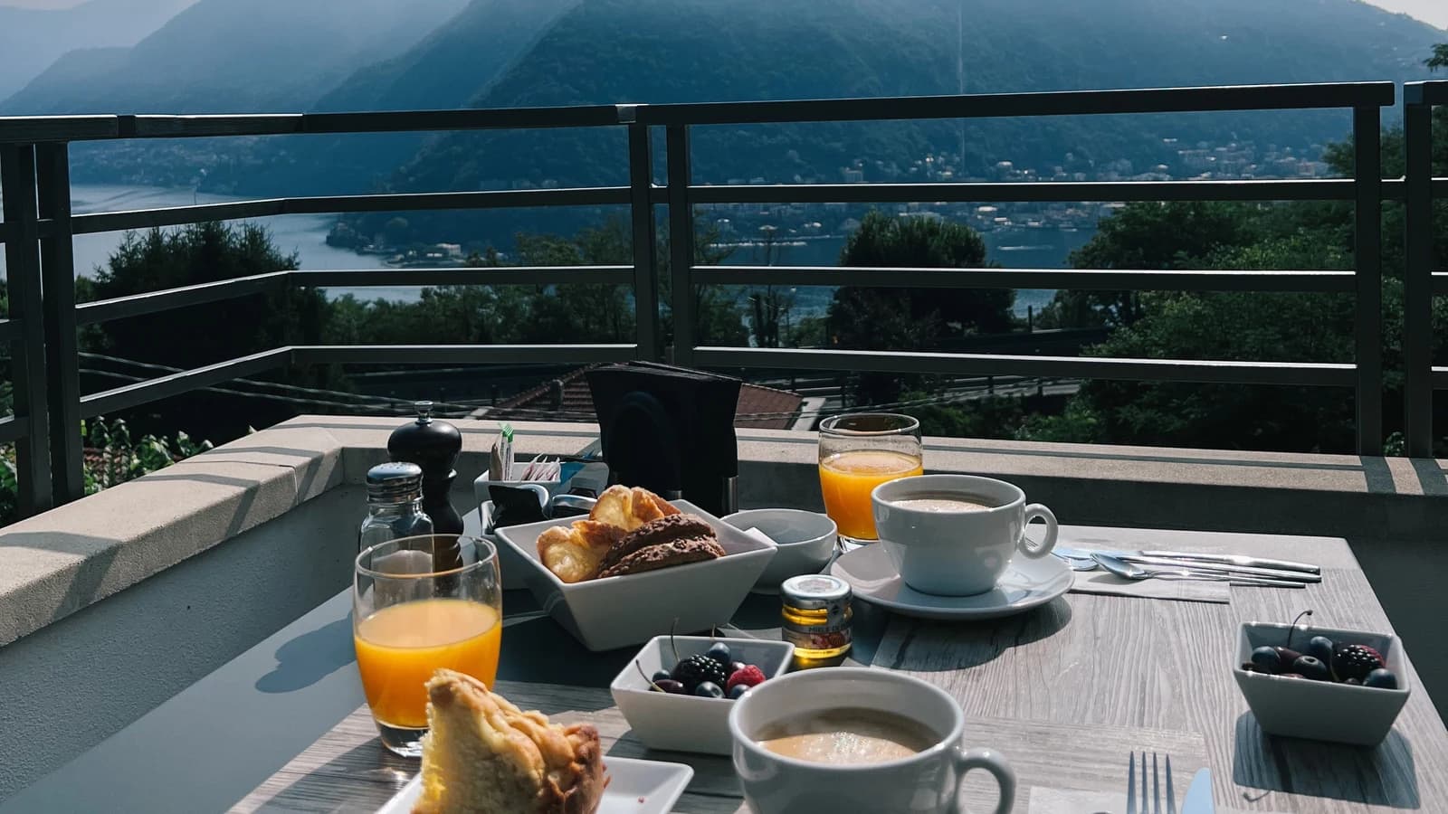 Breakfast on a terrace overlooking mountains